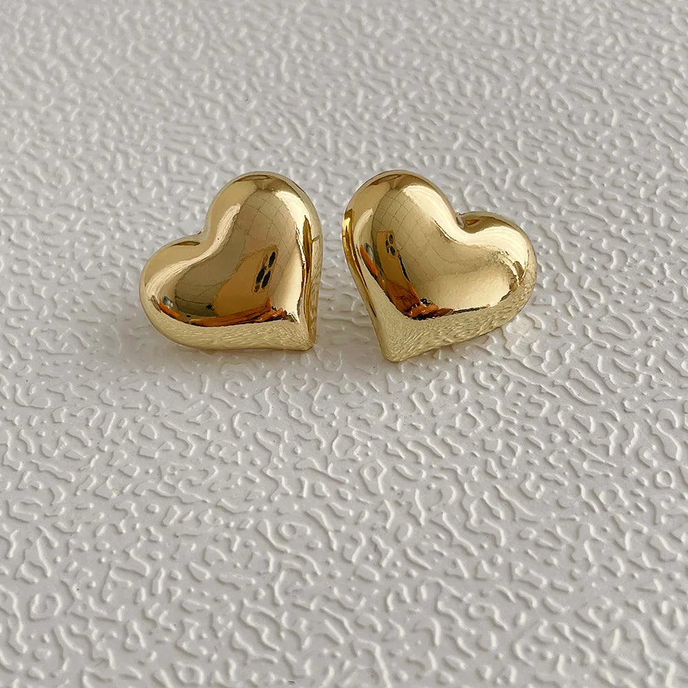 Minimalist Silver LOVE Heart Stud Earrings – Elegant Allergy-Preventing Jewelry for Women